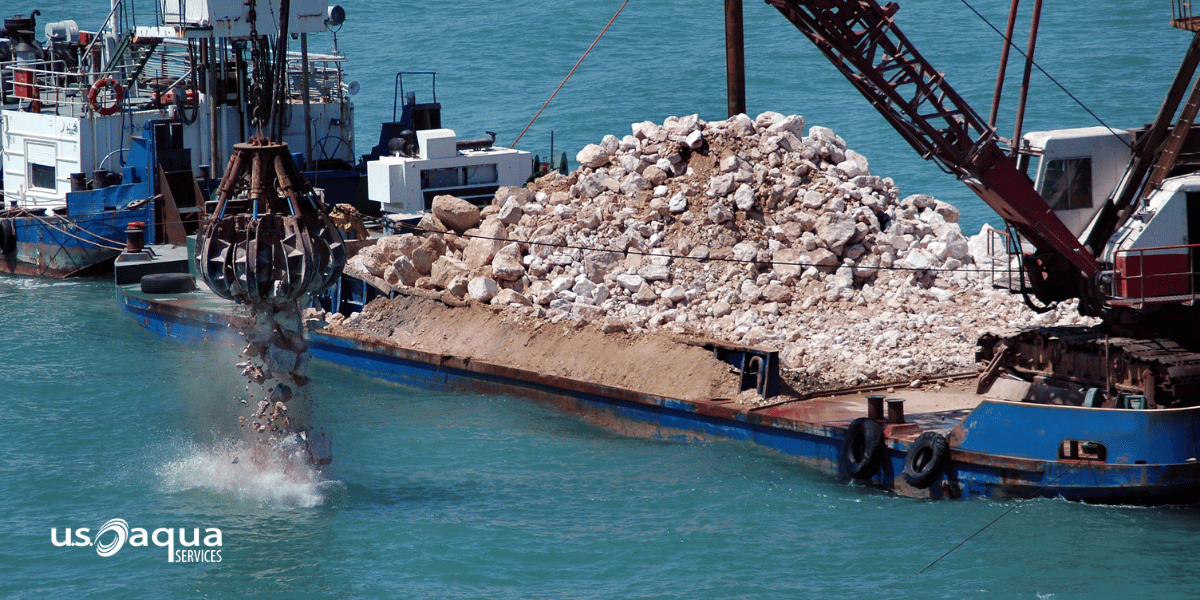Large dredging equipment distributing dredged material into the gulf